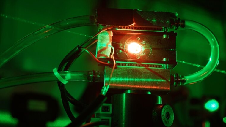 Frequency doubling in a nonlinear optical crystal.