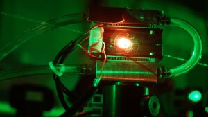 Frequency conversion in a nonlinear optical crystal.