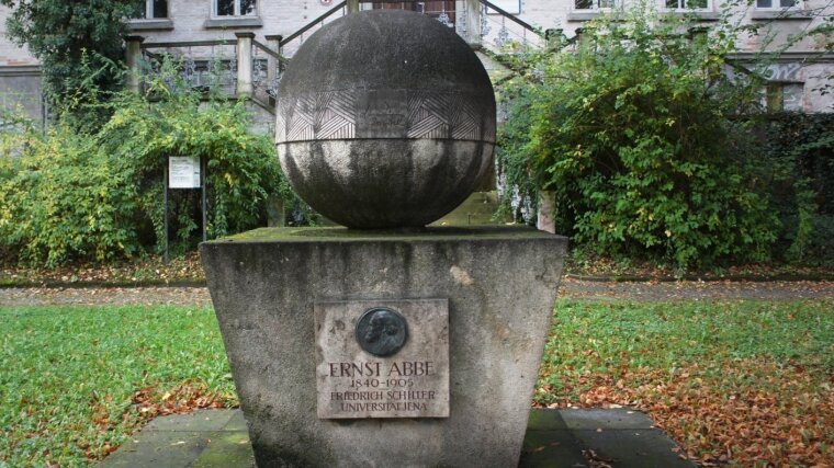 Monument in Jena in memorial of Ernst Abbe and his famous diffraction limit formula.