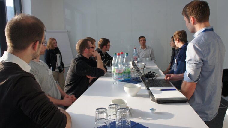 ASP PhD students meeting Dr. Jörg Petschulat and Dr. Michael Kempe at ZEISS in 2013.